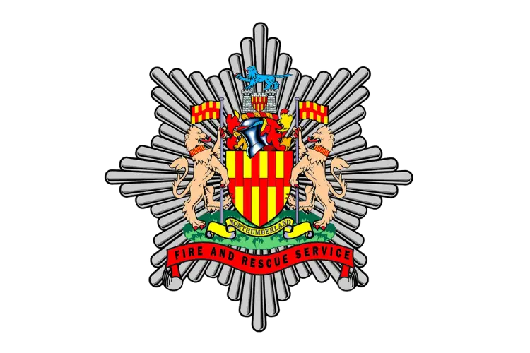 Official Fire and Rescue Service crest featuring a heraldic shield, two lion supporters, and a red ribbon reading 'FIRE AND RESCUE SERVICE'